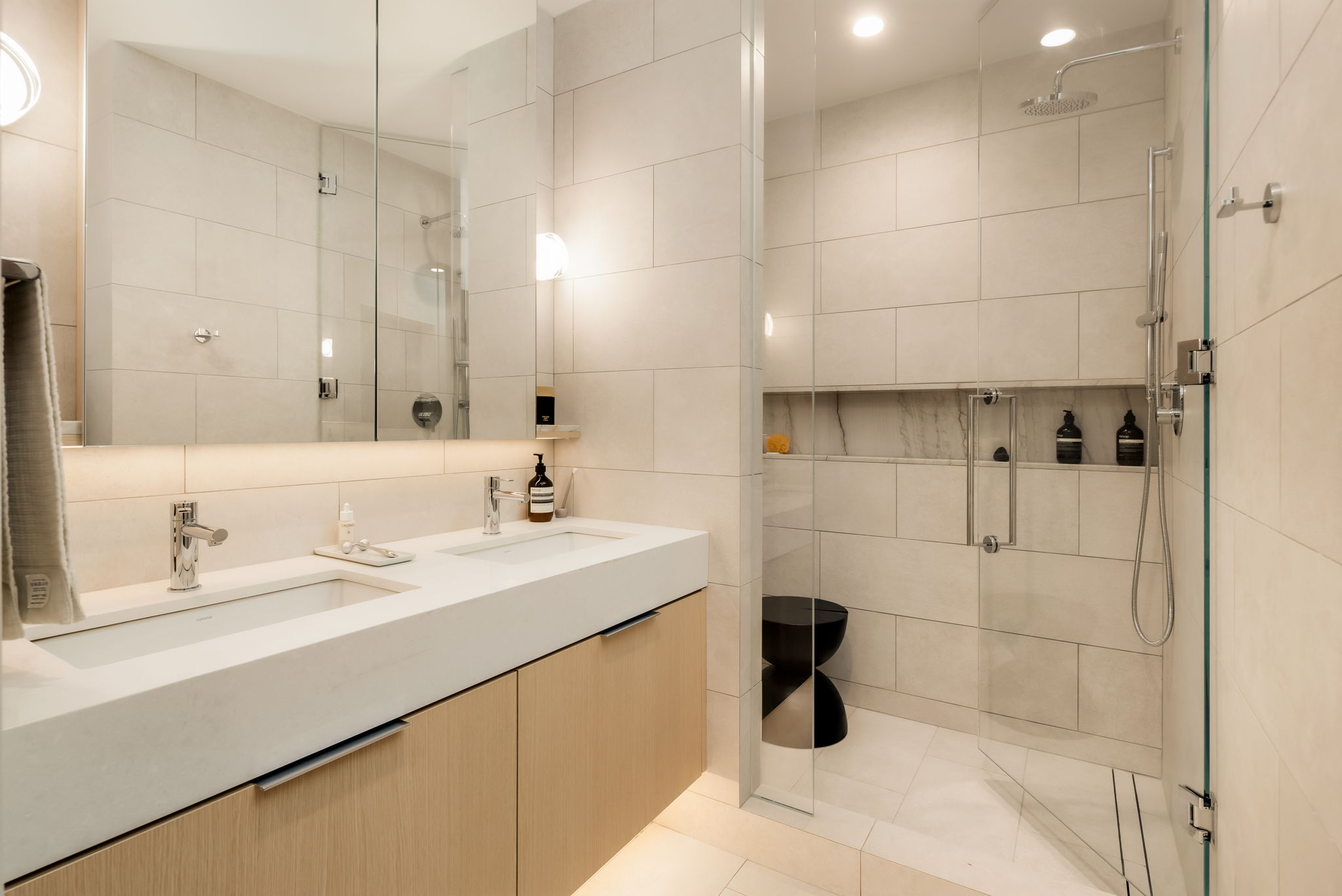 Floor-to-ceiling tiling at spa-style bathroom